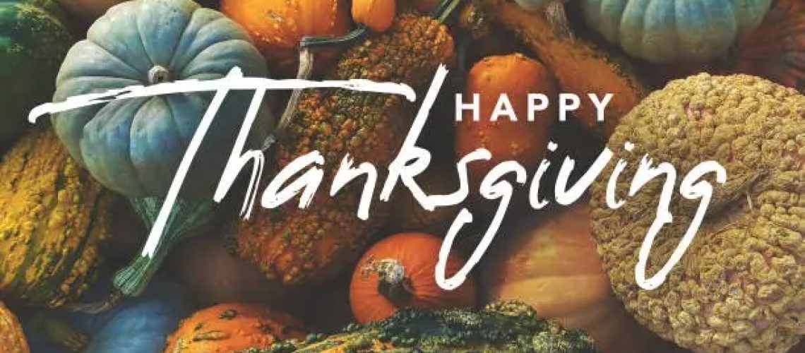 Happy Thanksgiving Holiday Greeting Card Handwriting Calligraphy Text Design with Fall Pumpkins, Squash and Gourds Colorful Background Texture